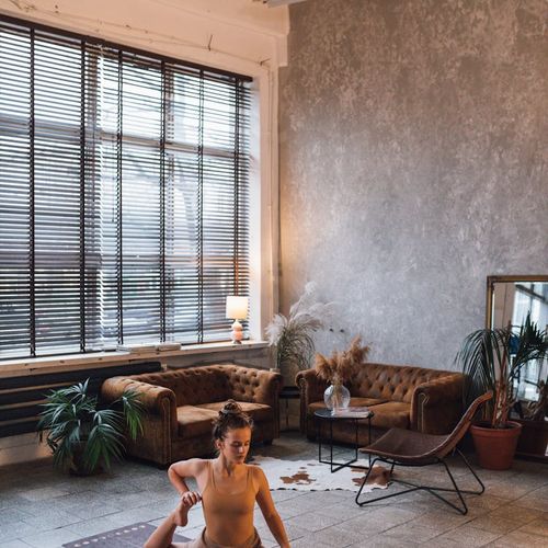 Minimalist room with a yoga mat and soft lighting